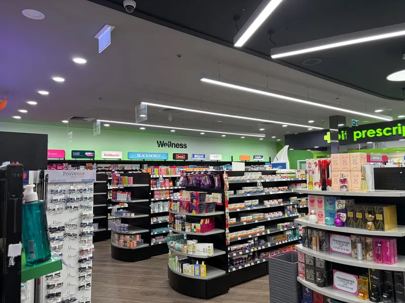 Retail aisles and the prescriptions counter inside Priceline Pharmacy Sunshine Marketplace