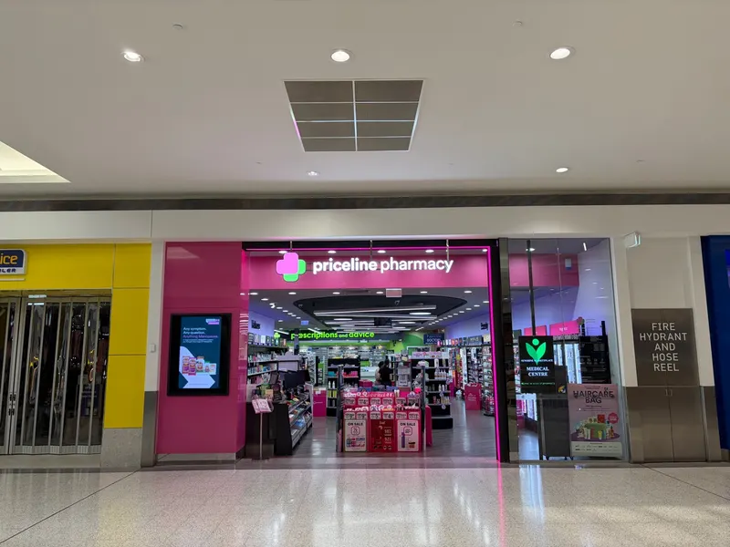 Priceline Pharmacy entrance with pink signage inside Sunshine Marketplace shopping centre